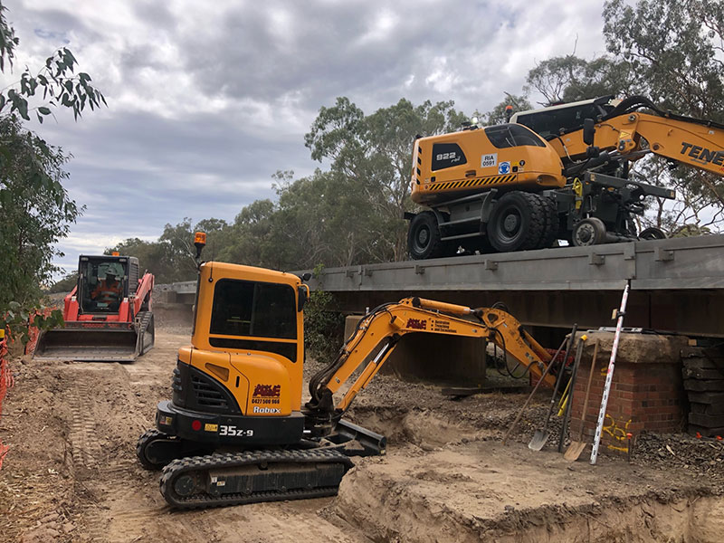 Excavator performing site cuts in Central Victoria