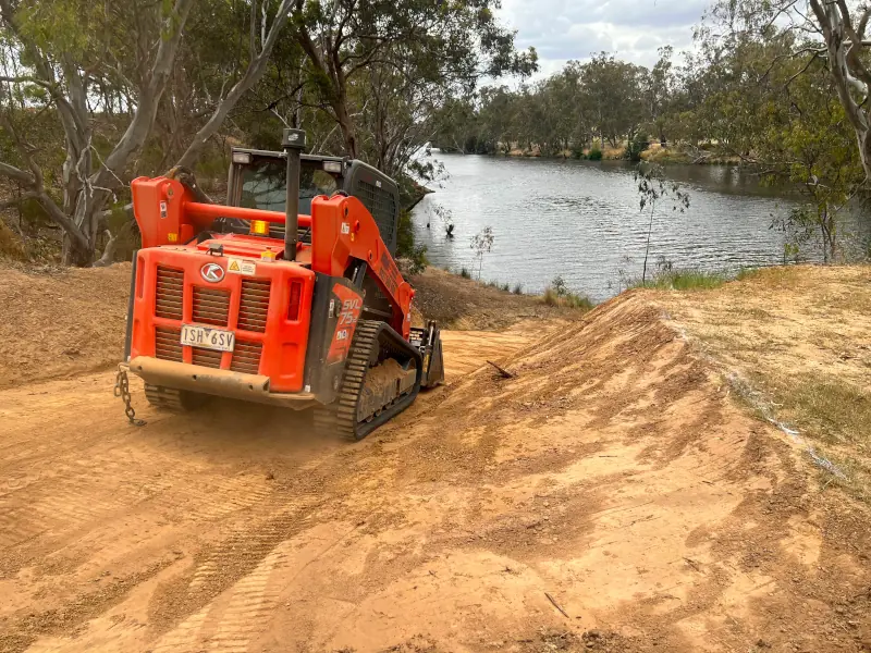 Skid Steer clearing application from your local excavation contractor